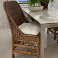 Plantation rattan dining chair with seat pad - hamptons style - close up of side view