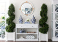 White PVC planter box with topiary plant in Hamptons living room